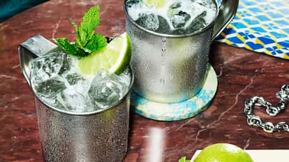 two Absolut Mule coctail glaases