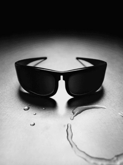 Charli xcx sunglasses with a Absolut bottle outlined over the bridge