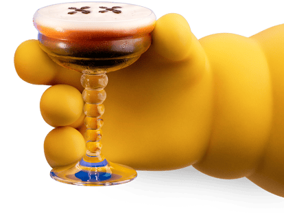 Chum's hand holding an Absolut XXpresso Martini, the signature cocktail for Absolut KAWS.