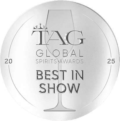 Silver medal from the TAG Global Spirits Awards 2025 featuring “Best in Show” text and a stylized tasting glass icon.