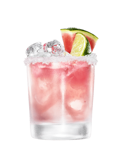 Close up image of a spicy watermelon vodkarita in a shot glass with ice and watermelon slice and lime wedge for garnish