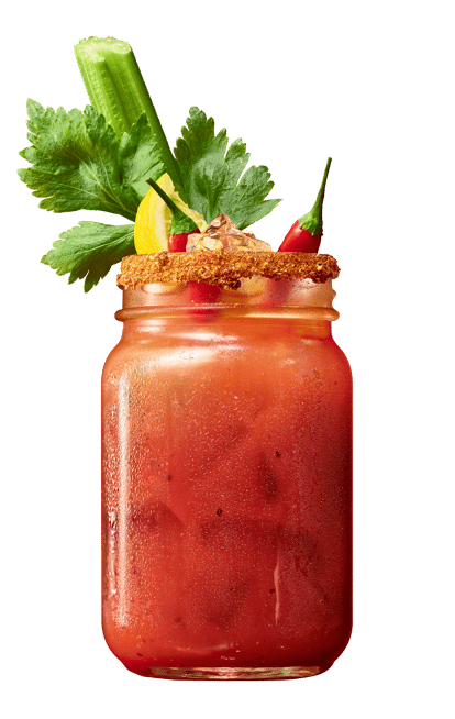 Spicy Bloody Mary cocktail in a frosted jar, garnished with celery, lemon, parsley, and red chili pepper on a black background.