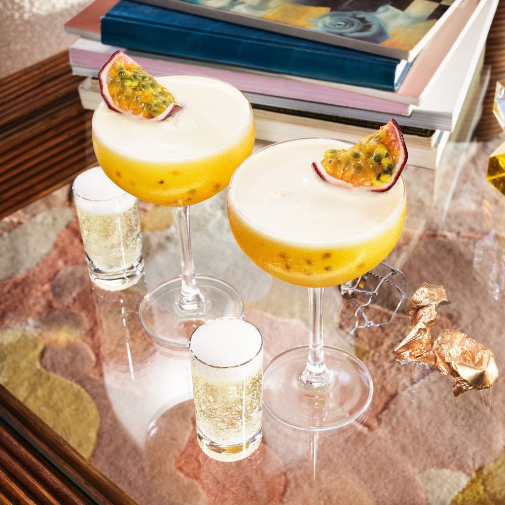Two Pornstar Martini cocktails with two shots of champagne.
